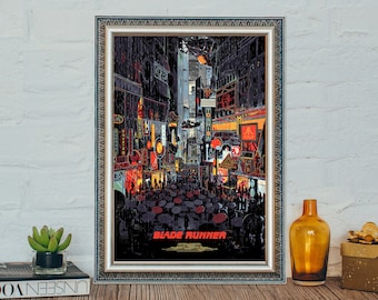 May include: A framed poster with a retro-futuristic cityscape illustration in shades of orange, yellow, and blue. The poster features the text "Blade Runner" in a bold, white font.