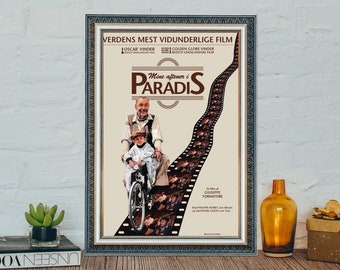 May include: A framed movie poster with a vintage design. The poster features a black and white photo of two people riding a bicycle. The poster is titled "Mine aftener i PARADIS" and includes the text "VERDENS MEST VIDUNDERLIGE FILM".