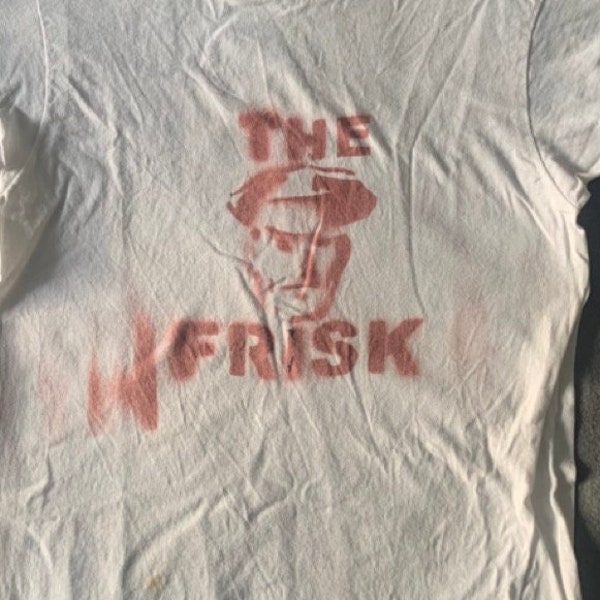 The Frisk- Officer not-so-friendly spraypaint shirt