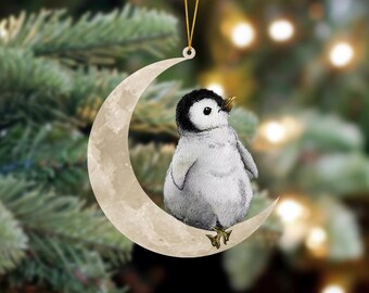 Penguin se sienta en la luna colgante ornamento adorno de perro, adorno de coche, adorno de Navidad, regalo de adorno de pingüino, regalo de Navidad de pingüino