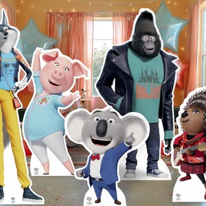 May include: A collection of five cardboard standees featuring animated characters from the movie Sing, including a wolf in a blue shirt, a pig in a light blue shirt, a gorilla in a leather jacket, a koala in a blue suit, and a porcupine.