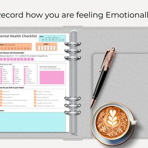 May include: A mental health checklist with sections for sleep, water intake, emotional well-being, and physical symptoms. The checklist is printed on a light blue and white background with pink accents. The checklist is open to a page titled "How did you feel emotionally?" and "How do you feel in your body?"