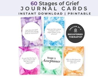 May include: A set of 60 printable journal cards with watercolour backgrounds. Each card features a different question related to the five stages of grief: denial, anger, bargaining, depression, and acceptance. The cards are designed to help individuals process their grief and find healing.