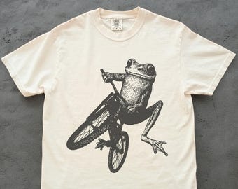 Frog Riding Bike T-Shirt: Funny Cycling Toad Tee, Bicycle Lover Gift, Cute Animal Biker Shirt for Frog and Toad Fans