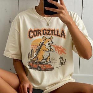 Funny Corgi Godzilla Shirt – Vintage Cartoon Corgzilla Tee with Sunset, Destroying Cat and Car, Retro Kaiju Meme Gift for Dog Lovers