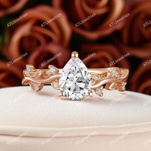 Pear Cut Moissanite Twig Ring: 14k Rose Gold Leaf Engagement