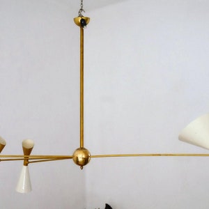 1950's Mid Century Four Arm Brass Asymmetrical Chandelier, White Gold Pivot Shades, Stilnovo Style Mid Century Industrial Ceiling Fixture