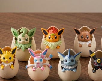 May include: A collection of nine small Pokémon character figurines, each emerging from a cracked, cream-colored egg shell. The figures include various colorful creatures with distinct features like pointed ears, fur collars, and unique facial expressions.