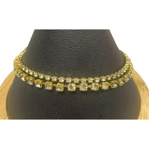 Vintage Gold Tone and Rhinestone Tennis Bracelet Set, one signed AVON
