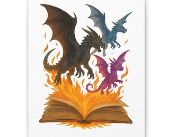 May include: A canvas print featuring a fantasy scene with four dragons. A black dragon is in the foreground, with a blue and purple dragon in the background. The dragons are emerging from a book engulfed in flames.