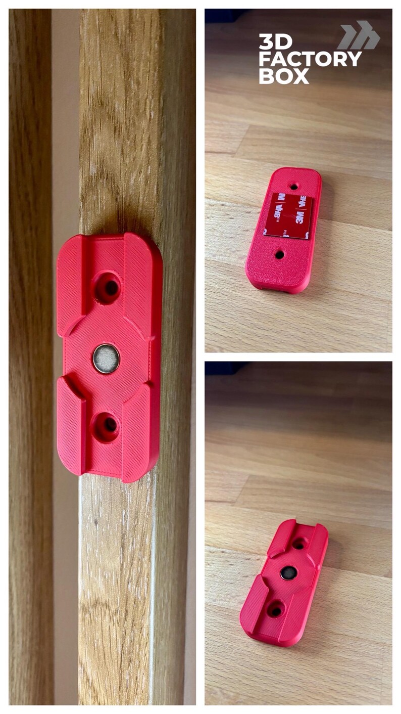 May include: Red 3D-printed mounting bracket with a magnetic center and two screw holes. The bracket is shown attached to a wooden surface and also separately. The text "3D FACTORY BOX" is visible in the image.