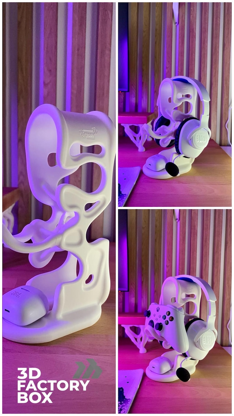 Peut inclure: Support blanc imprim&eacute; en 3D pour casque et manette. Le support maintient un casque JBL blanc et une manette Xbox blanche. Le support porte le texte "3D FACTORY BOX" sur le devant.