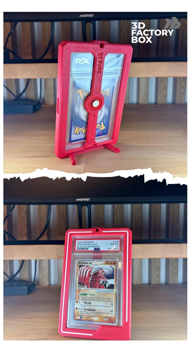 May include: Red 3D Factory Box card holder with a graded Pok&eacute;mon card inside. The card features a red Groudon ex character. The holder has the text "3D FACTORY BOX" and "AMZFAST".