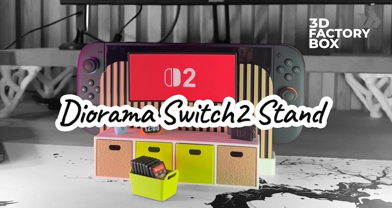 May include: A diorama Switch 2 stand with a miniature entertainment center. The stand features a large screen with the number "2" on it, a small cabinet with drawers, and a neon green container holding game cartridges. The text "Diorama Switch 2 Stand" is displayed.