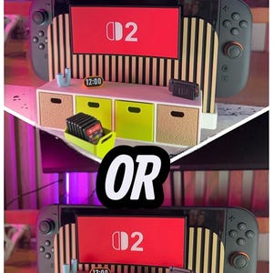 May include: A 3D Factory Box display featuring a Nintendo Switch console with a red screen displaying the number "02". The display includes a miniature cabinet with drawers and a clock showing "12:00". The word "OR" is in the center of the image.