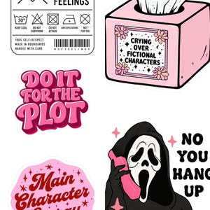 May include: A collection of five vinyl stickers featuring various designs: a white laundry care label with black text, a pink tissue box with the text Crying Over Fictional Characters, pink text reading Do It For The Plot, a pink circle with Main Character Energy text, and a black-hooded figure holding a pink phone with the text No You Hang Up.