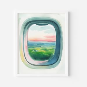 May include: A watercolor painting of an airplane window with a view of a green field and a pink and blue sunset sky.