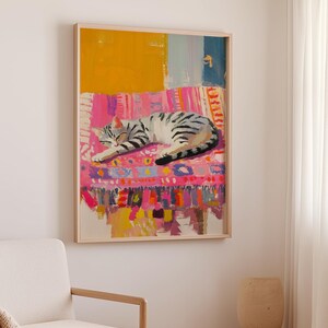 May include: A painting of a tabby cat sleeping on a colorful rug. The rug has a pink, yellow, blue, and green pattern. The cat is curled up on the rug and has its eyes closed.