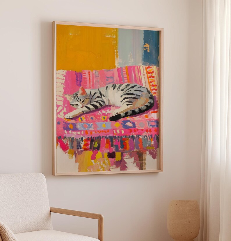 May include: A painting of a tabby cat sleeping on a colorful rug. The rug has a pink, yellow, blue, and green pattern. The cat is curled up on the rug and has its eyes closed.