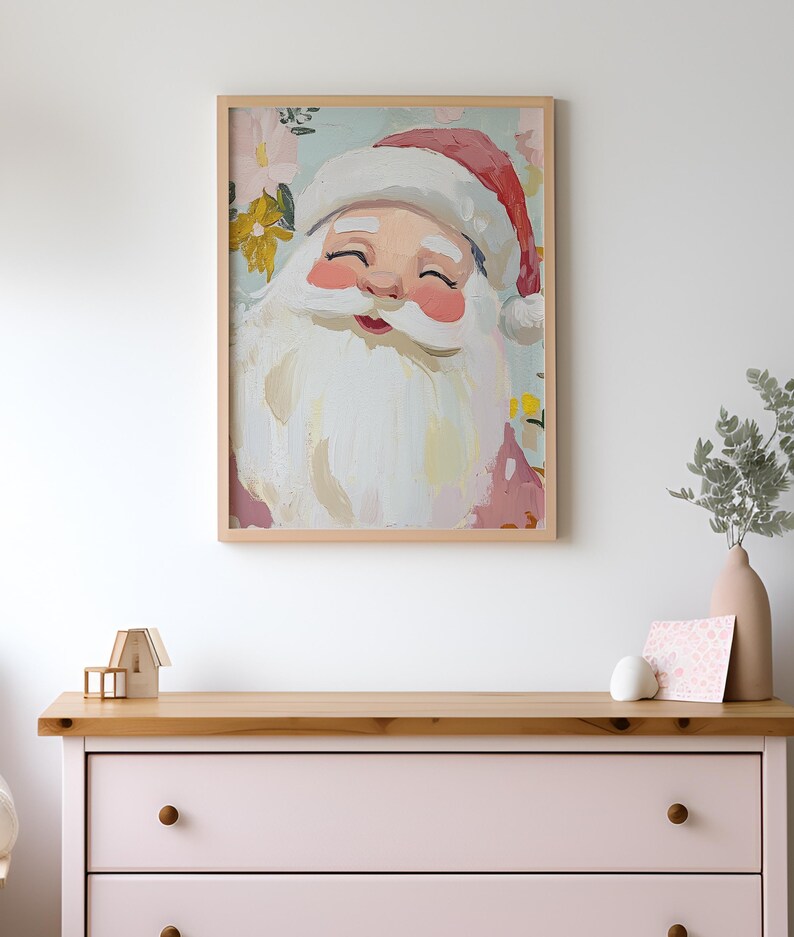 May include: A framed painting of Santa Claus with a white beard and closed eyes. He is surrounded by colorful flowers and a light blue background.