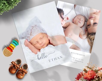 May include: A white card with the text "hello ETHAN" in gray script font. A photo of a baby wearing a white crocheted hat is on the card. The card is on a gray surface with a wooden toy and brown baby shoes.