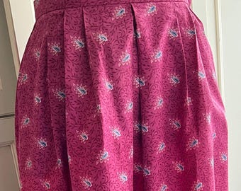Vintage skirt in French oulivado fabric. Rose Campano print with border trim. pockets, soft pleats. Made by Red Mill Collection.size 14 & 16