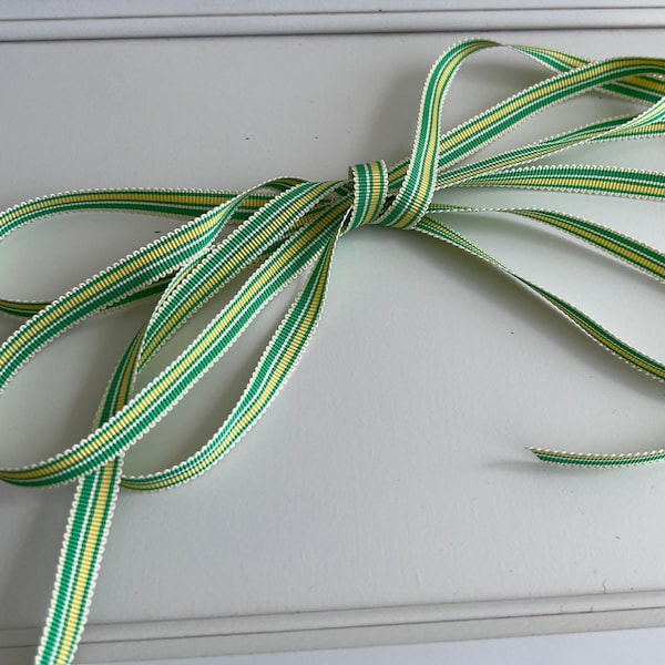 Vintage striped grosgrain 1/4" ribbon sold by the yard in a yellow/lime preppy stripe. 2 yard minimum.