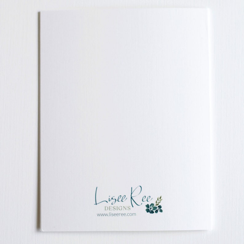 Back of white watercolor note card featuring the Lisee Ree logo.