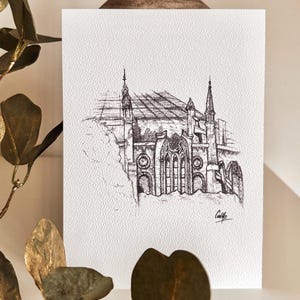 May include: Black and white ink drawing of a gothic style building with a pointed roof and tall windows. The drawing is on a white background.