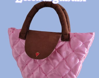 Handmade padded pink handbag by Lele Burgundhi