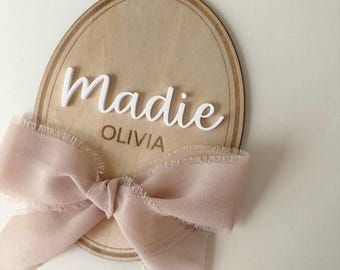 Personalised Oval Baby Name Sign – Wooden Name Plaque with Ribbon - Welcome to the World Plaque -  Wooden & Acrylic Scallop Name Sign