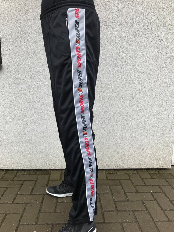 Black sweatpants with red and white stripe best sale