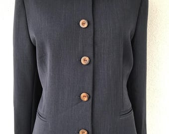 May include: A dark grey blazer with a fuzzy grey collar and five wooden buttons.
