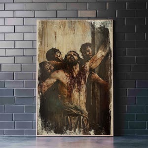 May include: A framed religious artwork depicting a man with blood on his body, being held up by several other men. The artwork has a distressed, aged appearance, with a muted color palette of browns, reds, and tans. The image is displayed against a brick wall.
