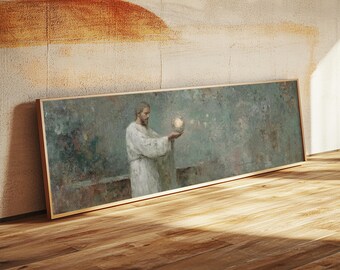 May include: A framed rectangular painting depicts a figure in white robes holding a glowing orb. The artwork has a muted color palette with shades of green, brown, and beige. The frame is a light brown color. The painting is leaning against a wall.