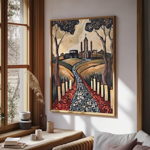 May include: A framed landscape painting depicts a road lined with candles leading to a church and a vintage car. The artwork features trees, a field, and a sky with a warm color palette. The painting is displayed in a room with a window.
