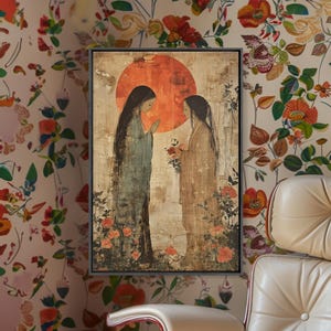 May include: Framed artwork depicting two figures in long robes, set against a large orange sun. The figures stand amidst roses, with one offering flowers to the other. The artwork has a vintage, textured appearance.
