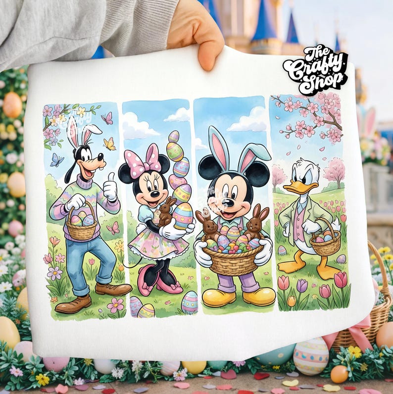 May include: A white fabric featuring a colorful Easter-themed illustration of Disney characters. Goofy, Minnie, Mickey, and Donald Duck are depicted with Easter eggs and bunny ears. The Crafty Shop logo is in the upper right corner.