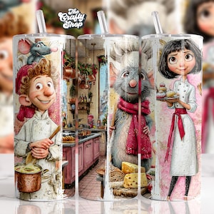 May include: A tumbler featuring illustrations of characters from a culinary-themed animated film. The design includes a chef, a rat, and a girl holding pastries, with a kitchen scene in the background. The Crafty Shop logo is at the top.