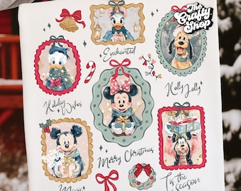 May include: A white square featuring festive Disney character illustrations in ornate frames. The design includes Donald Duck, Daisy Duck, Mickey Mouse, Minnie Mouse, and Goofy, with holiday-themed text like "Merry Christmas" and "Tis the season."
