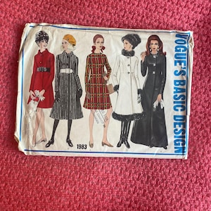 May include: Vogue's Basic Design sewing pattern for a coat, featuring five different styles. The pattern is from 1983 and includes a basic layout included.