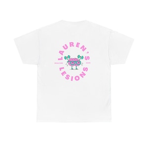 May include: White t-shirt with a graphic on the back. The graphic shows a pink brain wearing glasses and lifting weights, surrounded by a pink circle with the text "LAUREN'S LESIONS" and "WALK MS 2020".