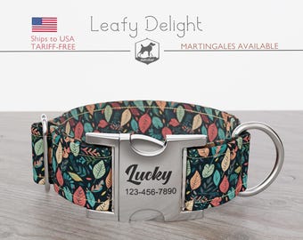 May include: A dog collar with a colorful leaf pattern in shades of green, orange, and red. The collar has a silver metal buckle with the name "Lucky" and a phone number. The collar is designed for dogs.