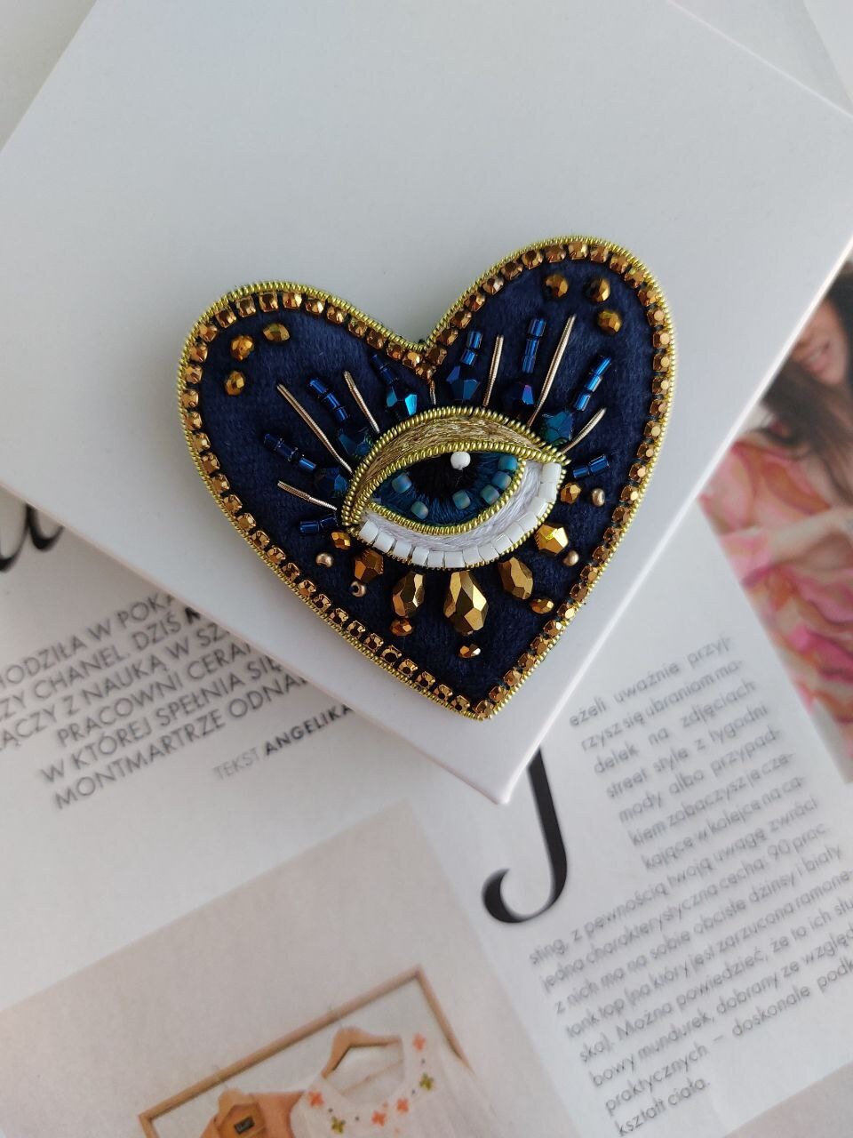 Spilla di sicurezza con occhio blu palma in bronzo per cintura da uomo