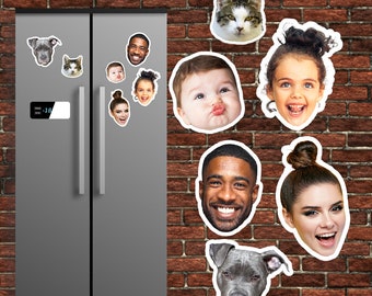 May include: A set of refrigerator magnets featuring various faces and animals. The magnets are printed on white paper and have a glossy finish. The magnets include a cat, a dog, a baby, a man, a woman, and a child.