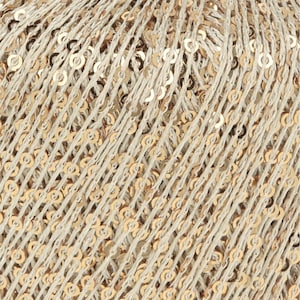 May include: Close-up of a textured, beige fabric adorned with rows of gold sequins. The sequins are evenly spaced and create a shimmering effect. The fabric appears to be a decorative textile, possibly for apparel or crafts.