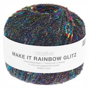 May include: A ball of yarn with a dark base color and flecks of rainbow hues. The yarn is wrapped with a white label that reads "MAKE IT RAINBOW GLITZ" in black text. The yarn is a tweed knit-in thread, made in Italy.