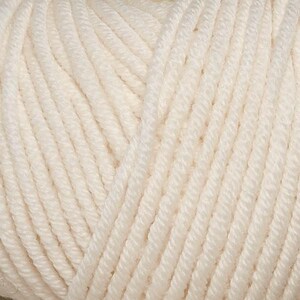 May include: A close-up of a skein of white yarn. The yarn is soft and fluffy, and it is perfect for knitting or crocheting.