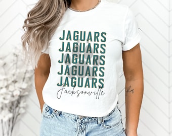 Jaguars repiten, Jacksonville, Jags, Duval, Bella Canvas 3001 unisex, ¡muchas opciones de color! ¡Pregunte si desea agregar un nombre o número personalizado a la parte posterior!