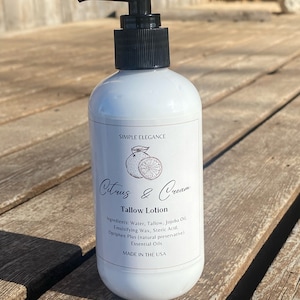 May include: White bottle of Citrus & Cream Tallow Lotion with a black pump top. The label has a citrus fruit illustration and the text "Simple Elegance".